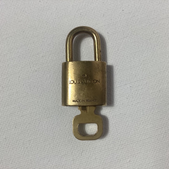 Authentic Louis Vuitton Lock and Key with Bag Accessory Key Chain - Picture 2 of 2